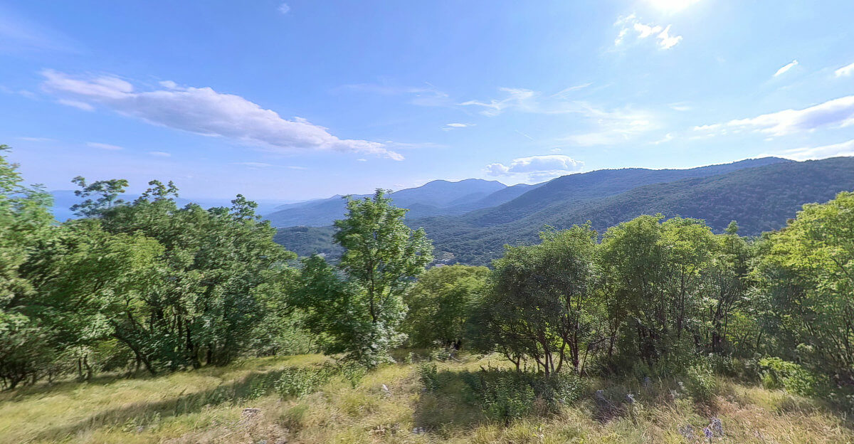 View southward towards Učka from the Opatijska planinarska obilaznica on Orjak.